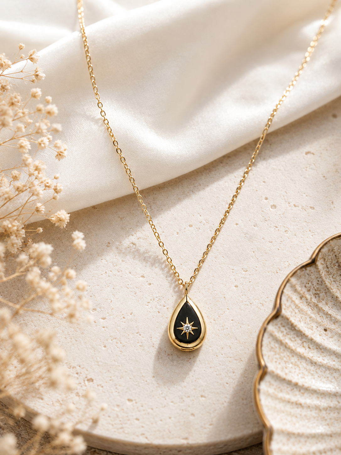 18K gold plated pendant, stainless steel teardrop design with a sparkling star pendent. - Image 2